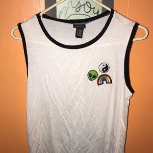 Super cute muscle tee with patches.